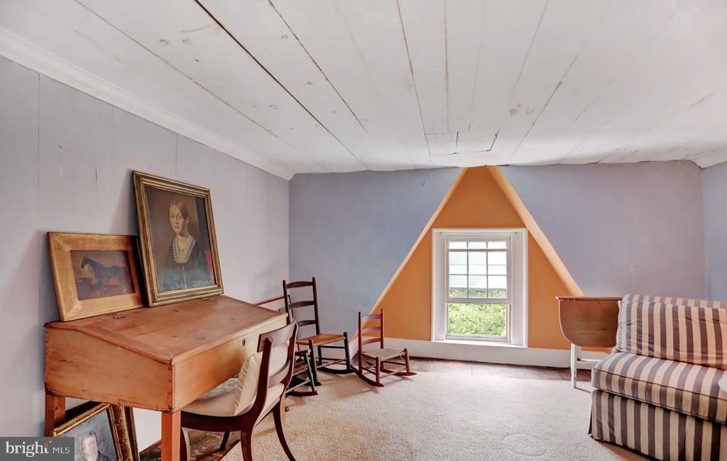 612 Old Rte 322 Spring Mills, PA 16875 - Photo 38 of 78 a bedroom with a bed and wooden floor