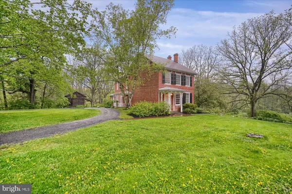 a front view of house with yard