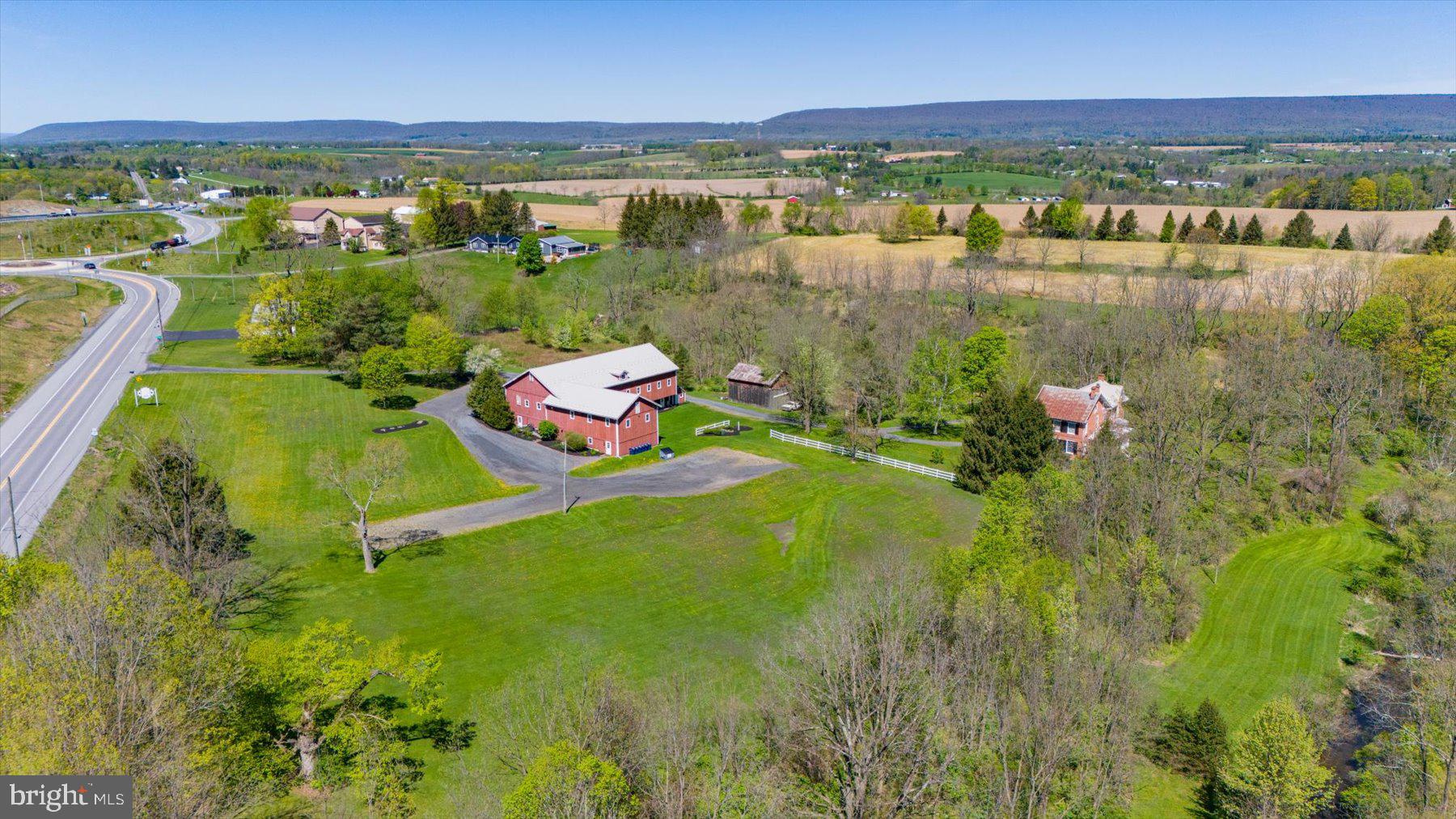 612 Old Rte 322 Spring Mills, PA 16875 - Photo 66 of 78 a view of a lake with a city