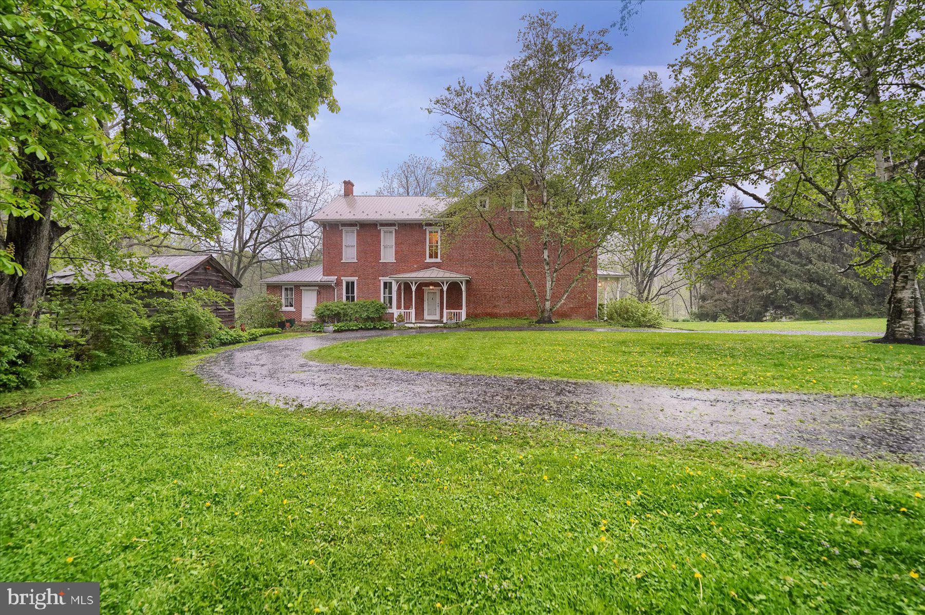 612 Old Rte 322 Spring Mills, PA 16875 - Photo 71 of 78 a view of a house with a big yard and large trees