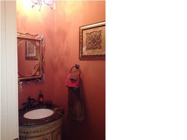 307 Inverness Cove Ridgeland, MS 39157 - Photo 9 of 23 Nice half bathroom off the kitchen.