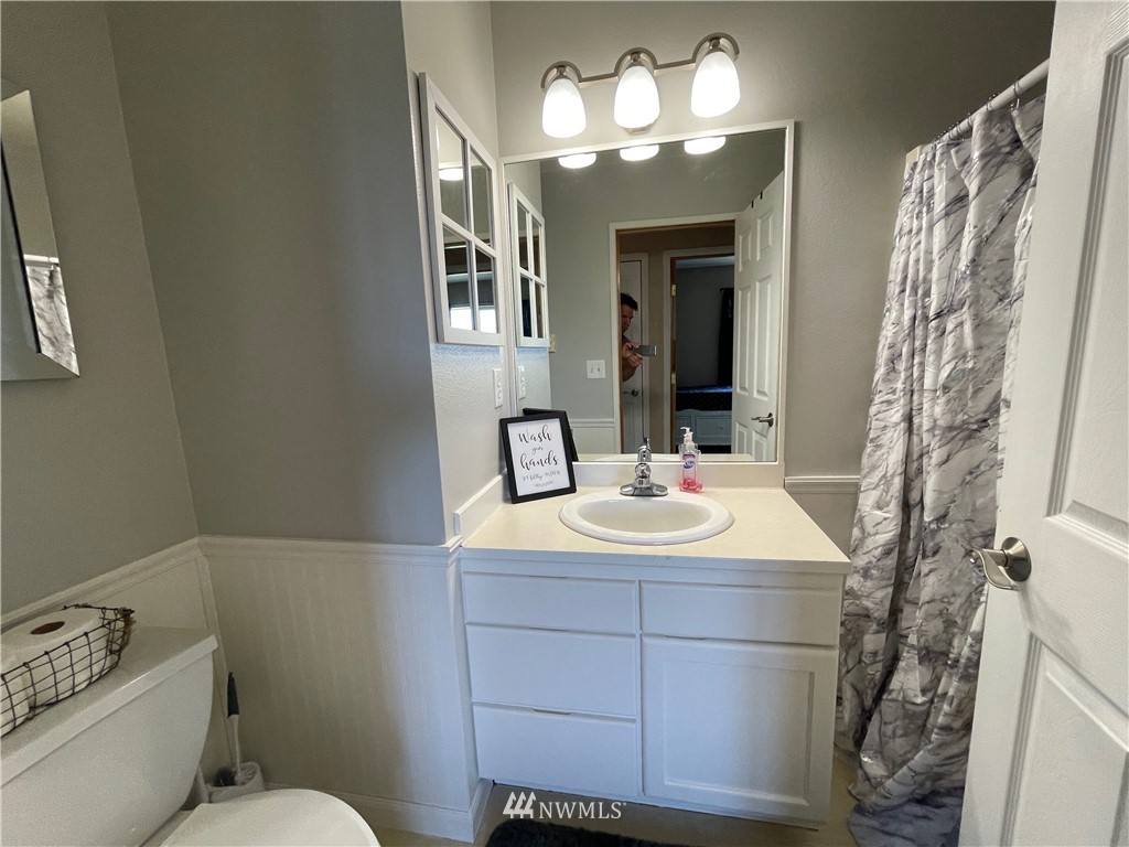 182 West Valley Road Chimacum, WA 98325 - Photo 12 of 35 a bathroom with a sink and a mirror