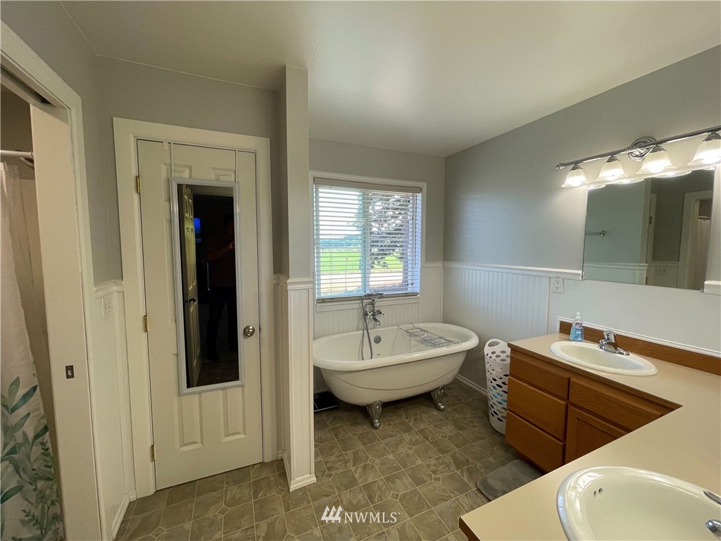 182 West Valley Road Chimacum, WA 98325 - Photo 20 of 35 a bathroom with a toilet sink and mirror