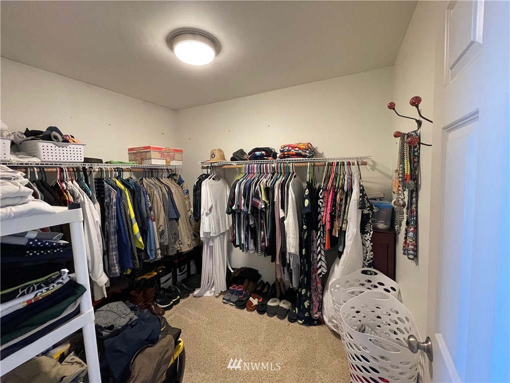 182 West Valley Road Chimacum, WA 98325 - Photo 22 of 35 a view of walk in closet with clothes