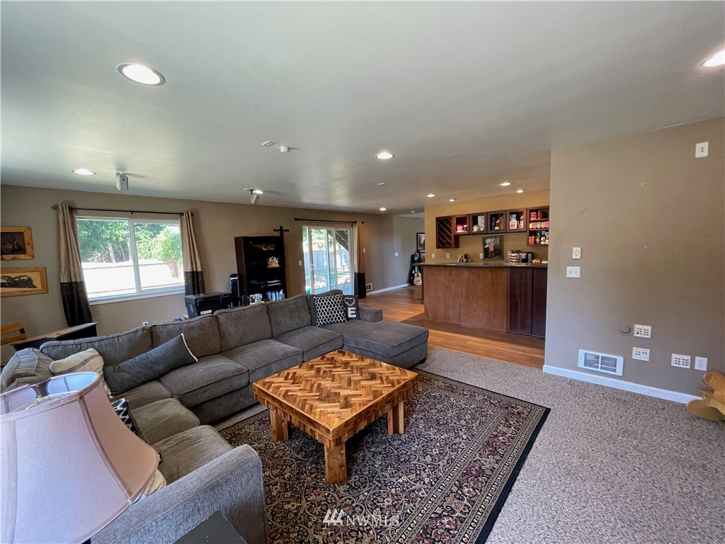182 West Valley Road Chimacum, WA 98325 - Photo 25 of 35 a living room with furniture and a rug