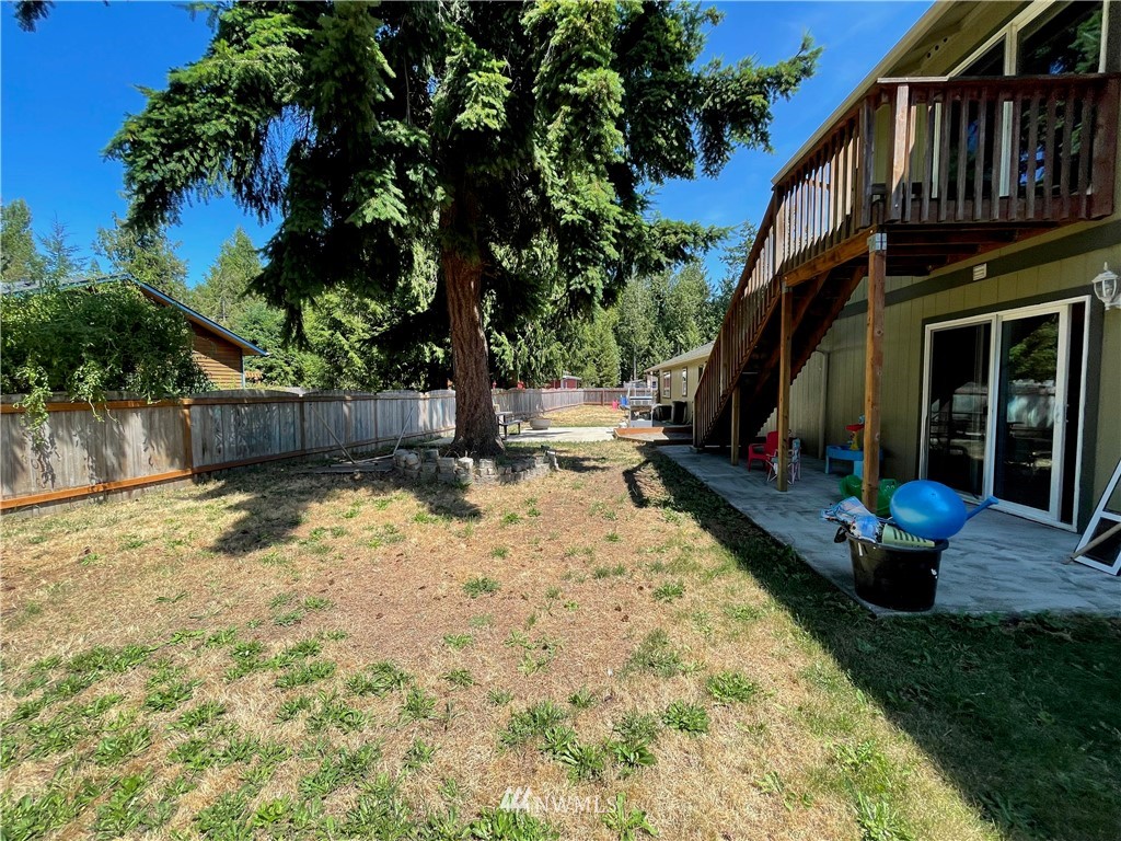182 West Valley Road Chimacum, WA 98325 - Photo 28 of 35 a view of a backyard with a large tree