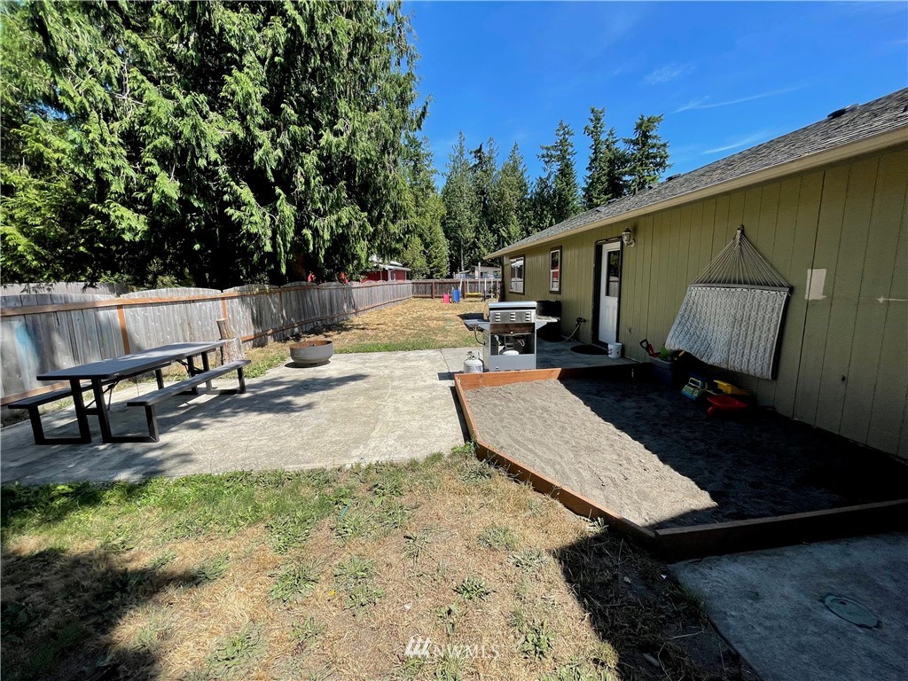 182 West Valley Road Chimacum, WA 98325 - Photo 29 of 35 a view of a backyard with sitting area