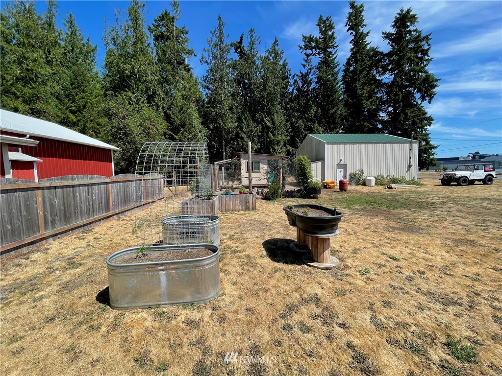 182 West Valley Road Chimacum, WA 98325 - Photo 31 of 35 a view of a backyard with sitting area