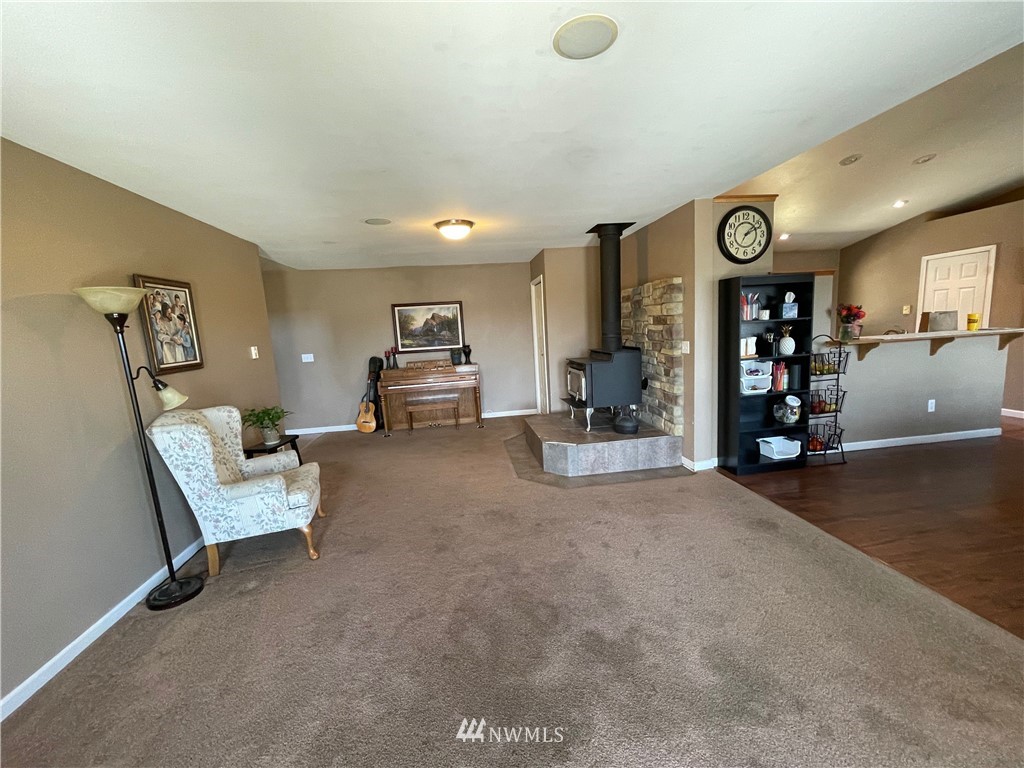 182 West Valley Road Chimacum, WA 98325 - Photo 5 of 35 a living room with furniture and a wooden floor