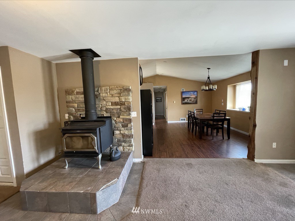 182 West Valley Road Chimacum, WA 98325 - Photo 7 of 35 a living room with furniture a dining table with kitchen view