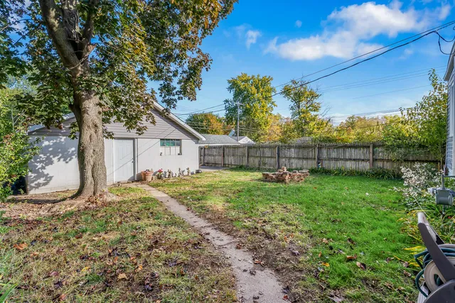 a view of backyard with green space