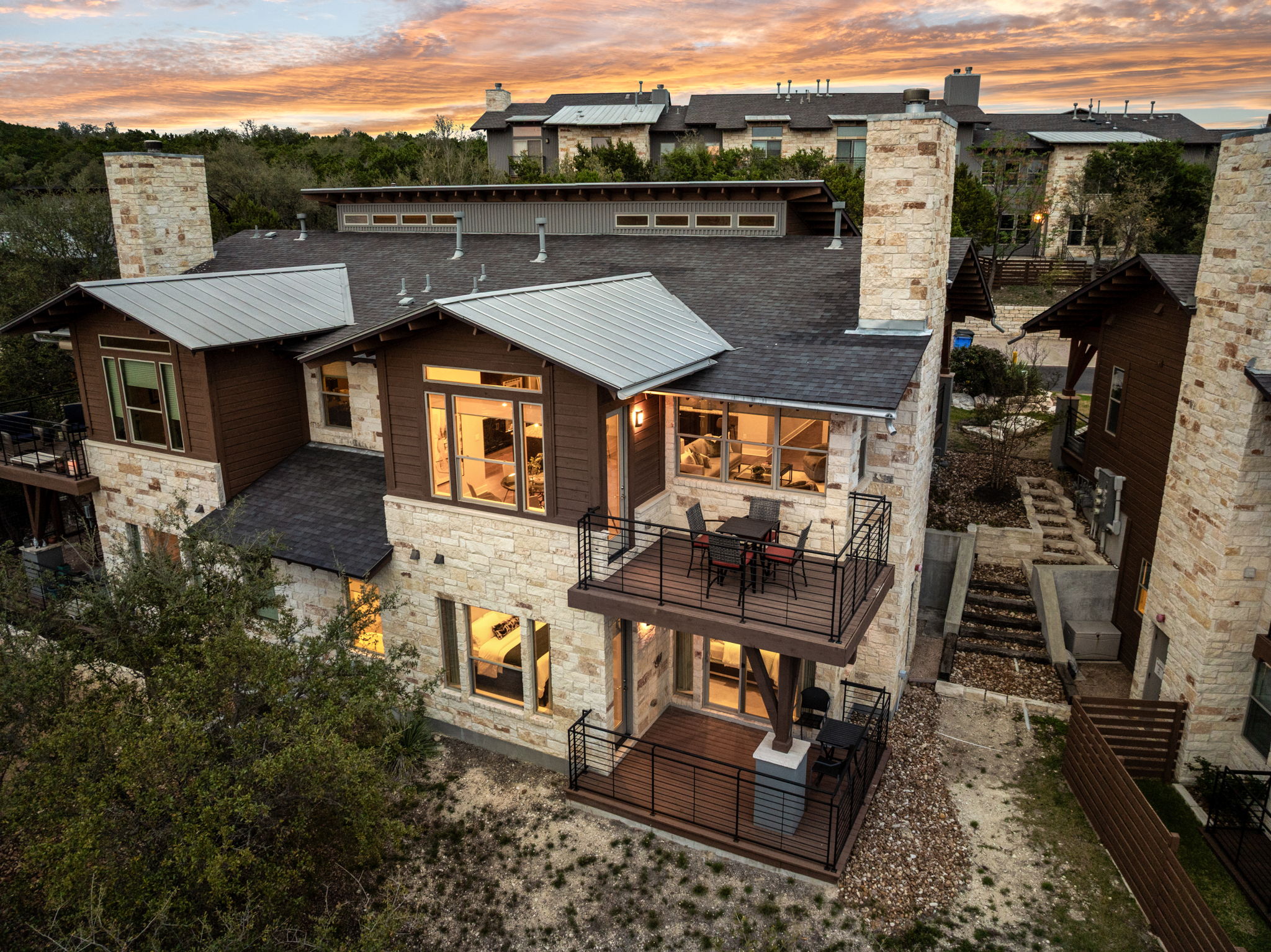 8110 Ranch Road 2222, Unit 81 Austin, TX 78730 - Photo 1 of 28 an aerial view of a house with a ocean view