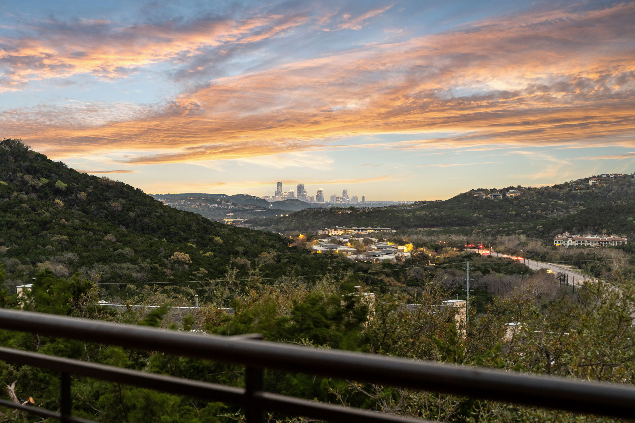 8110 Ranch Road 2222, Unit 81 Austin, TX 78730 - Photo 23 of 28 a view of city from a balcony