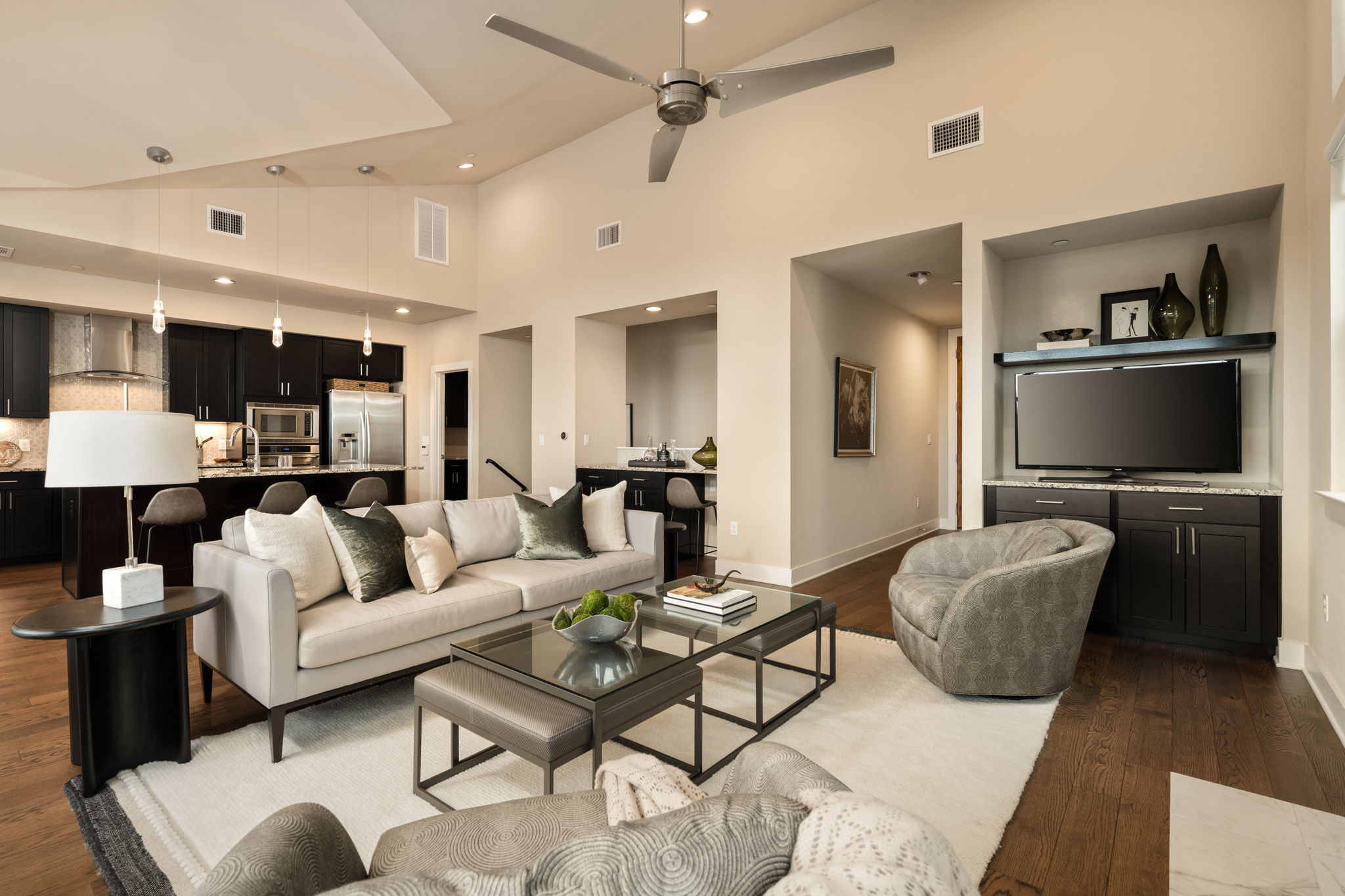 8110 Ranch Road 2222, Unit 81 Austin, TX 78730 - Photo 6 of 28 a living room with furniture and a flat screen tv