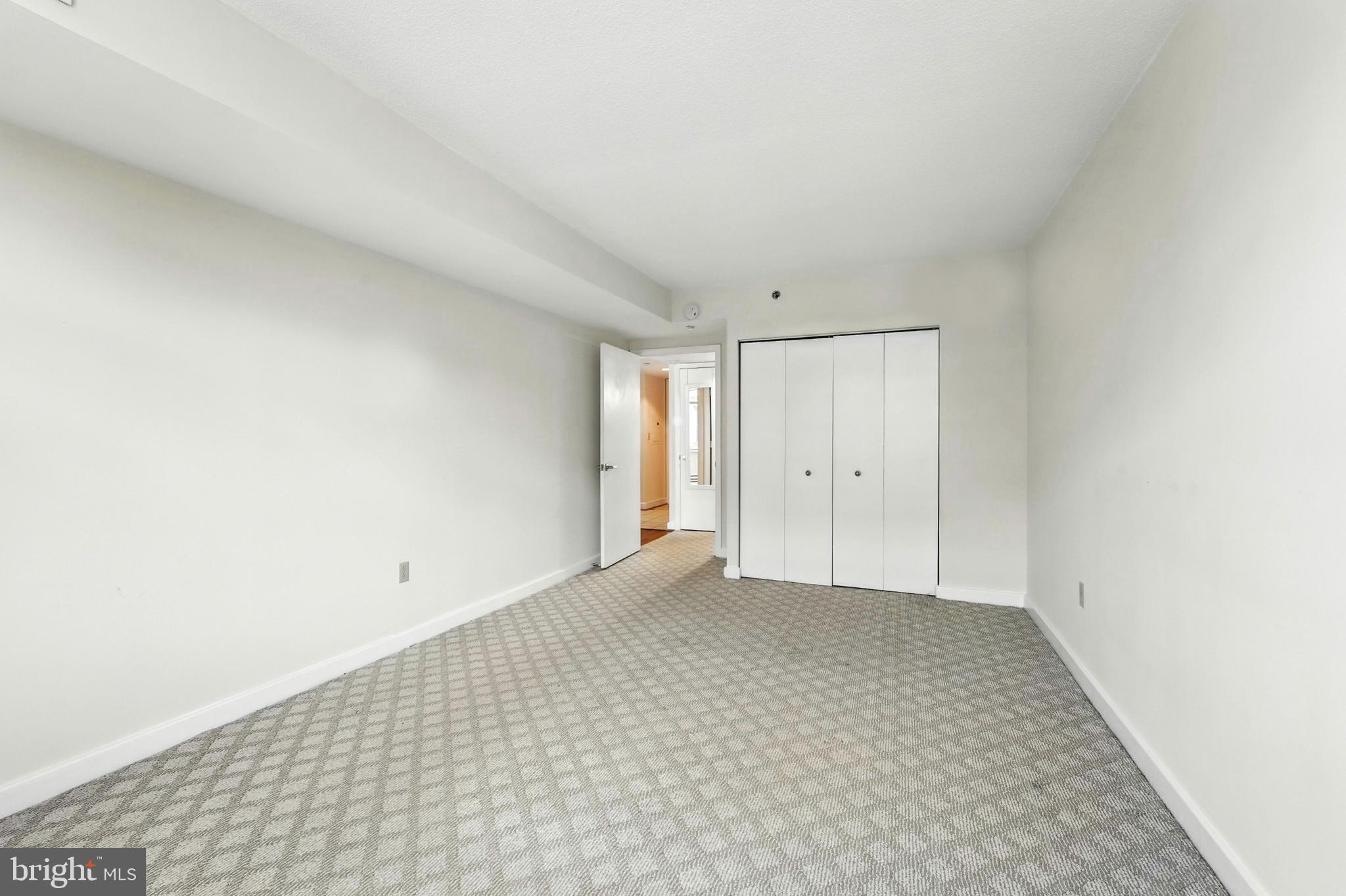 1150 K Street Northwest, Unit 1207 Washington, DC 20005 - Photo 16 of 29 a view of an empty room