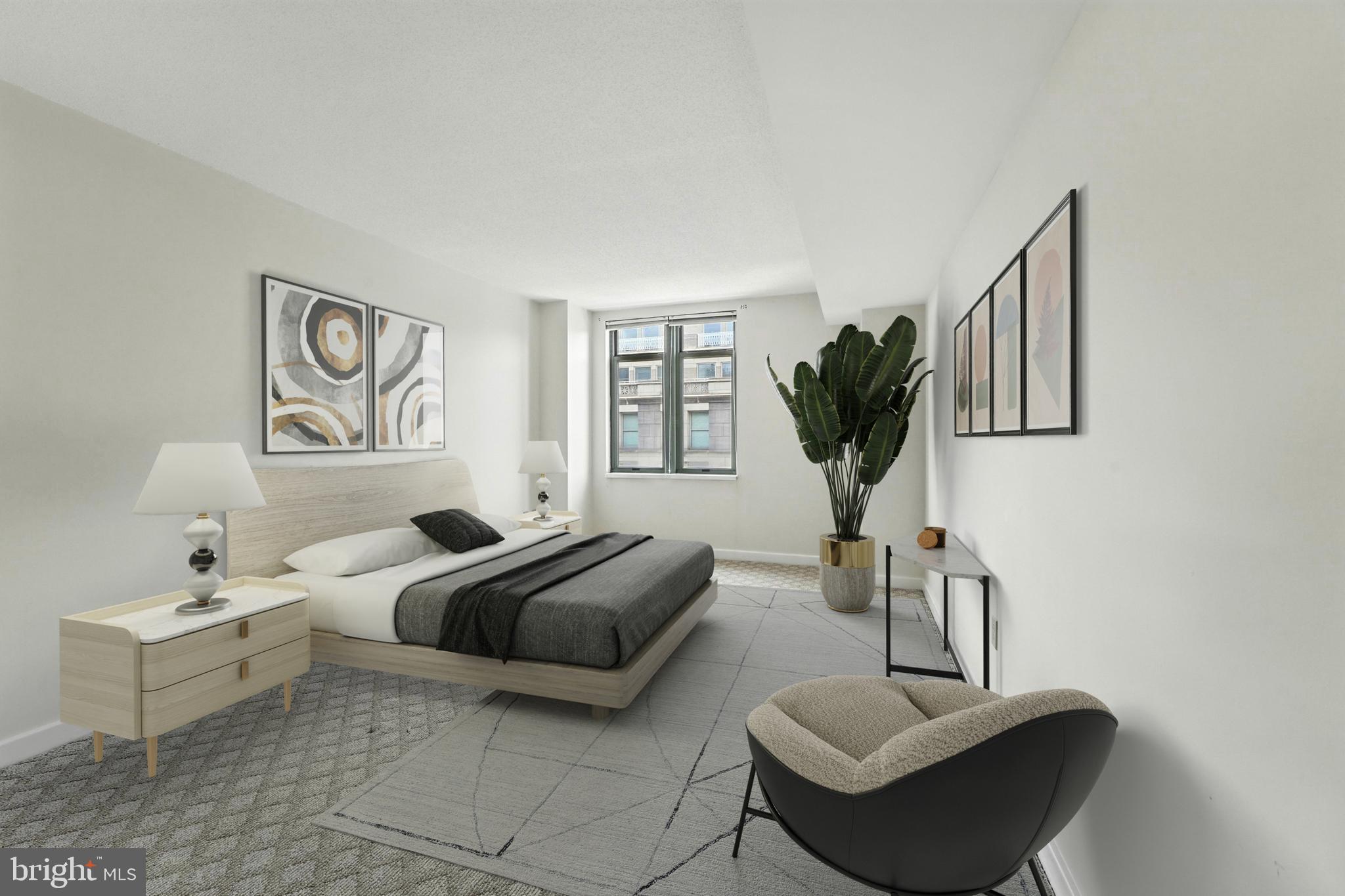 1150 K Street Northwest, Unit 1207 Washington, DC 20005 - Photo 3 of 29 a bedroom with furniture and a potted plant
