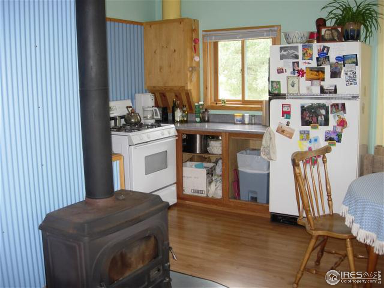 1654 Ridge Road Nederland, CO 80466 - Photo 8 of 18 a kitchen with a sink cabinets and window
