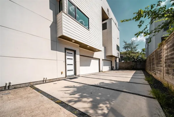 a view of a backyard of a house