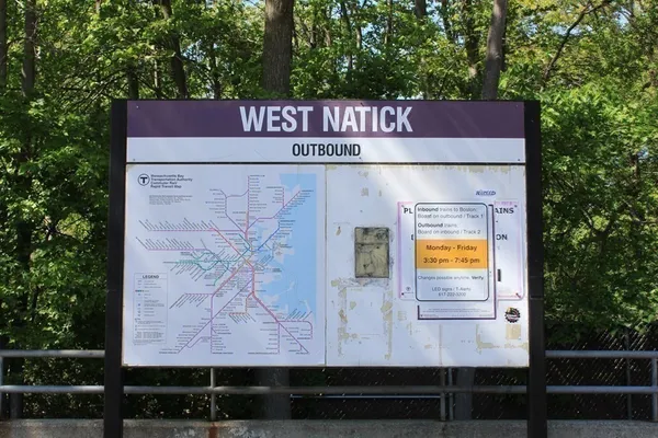 a sign that is on the wall of a building