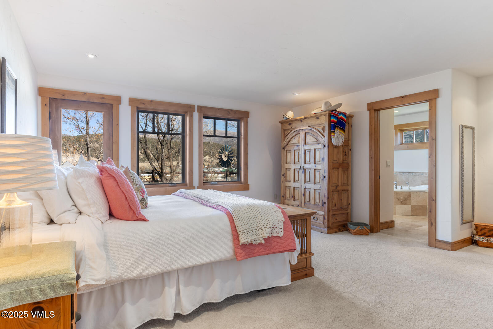 25 Sunset Court Eagle, CO 81631 - Photo 11 of 47 a bedroom with a bed and a window