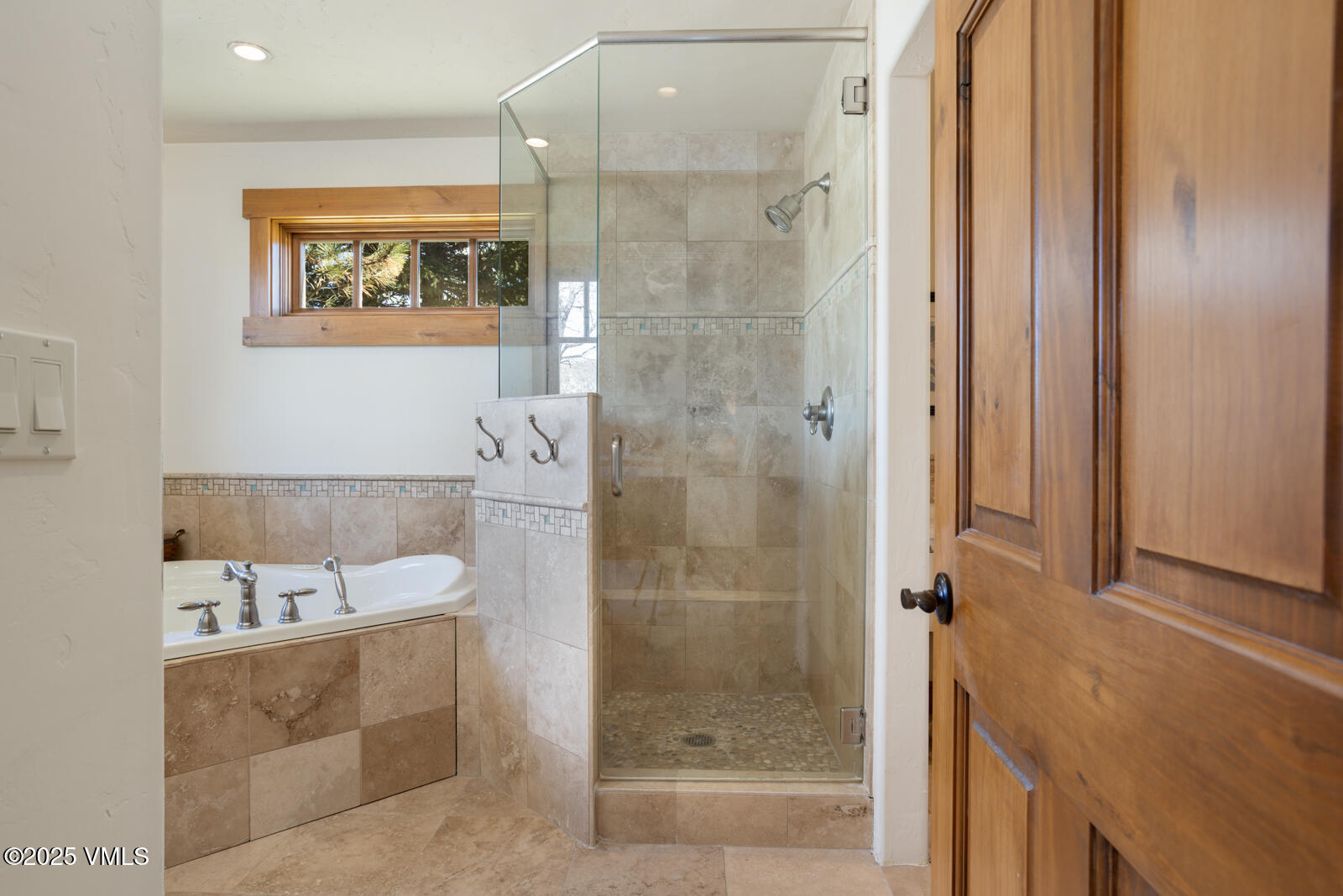 25 Sunset Court Eagle, CO 81631 - Photo 15 of 47 a bathroom with a bathtub and a shower