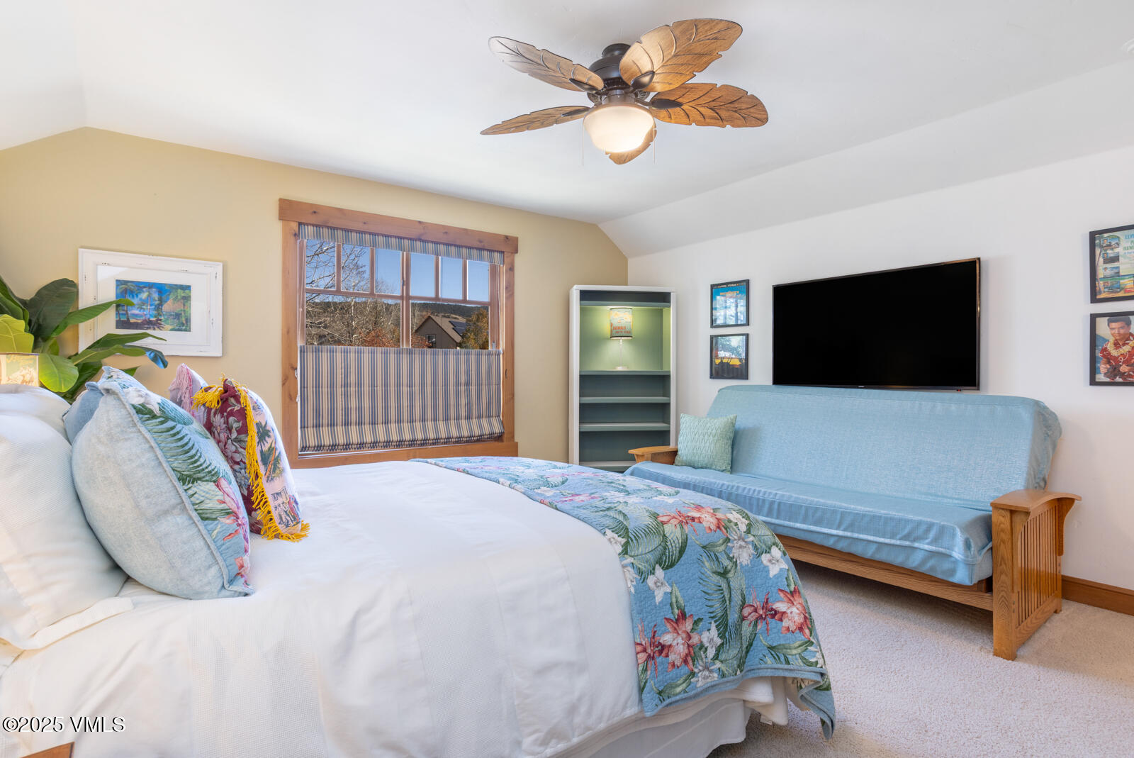 25 Sunset Court Eagle, CO 81631 - Photo 18 of 47 a bedroom with a bed and a flat screen tv