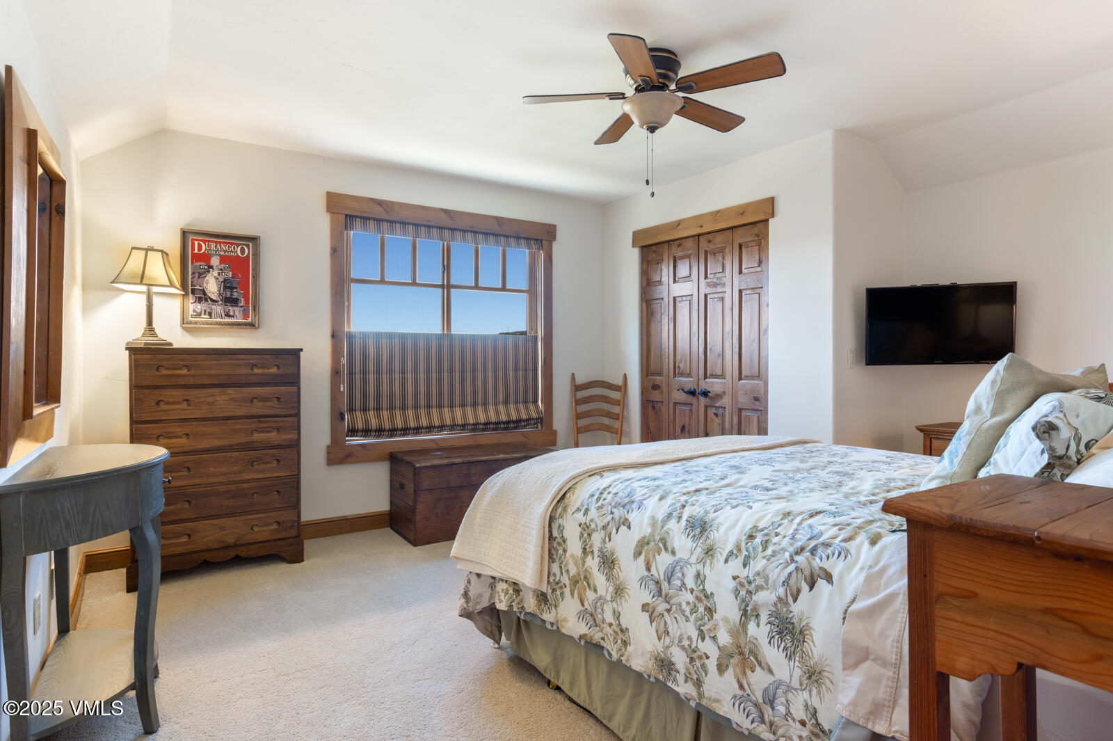 25 Sunset Court Eagle, CO 81631 - Photo 20 of 47 a bedroom with a bed and a television