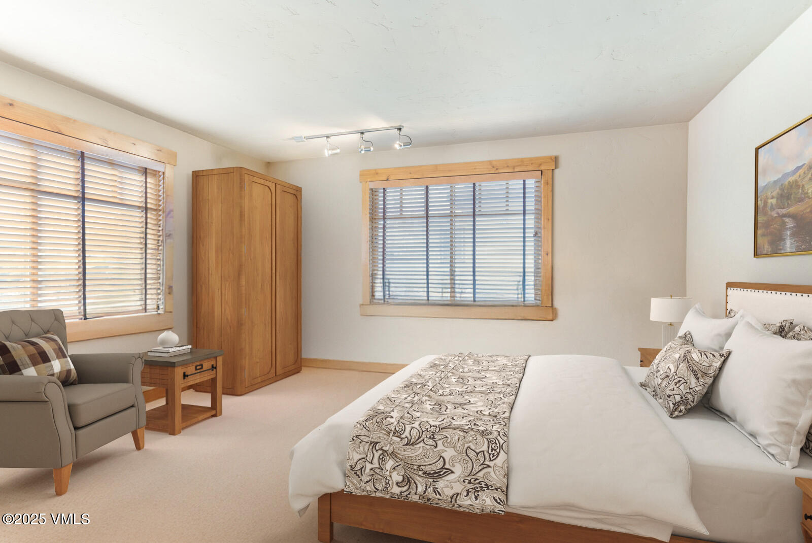 25 Sunset Court Eagle, CO 81631 - Photo 24 of 47 a bedroom with a bed and a couch with wooden floor