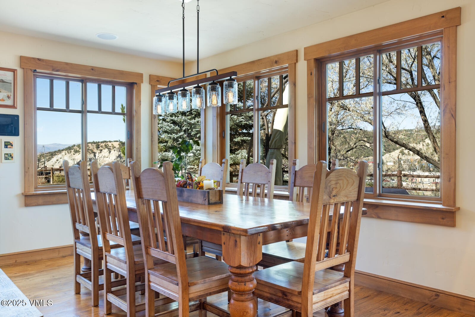 25 Sunset Court Eagle, CO 81631 - Photo 10 of 47 a view of a dining room with furniture window and wooden floor