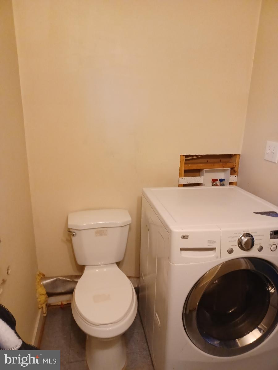 701 Appleton Street Baltimore, MD 21217 - Photo 16 of 29 HALF BATH WITH LAUNDRY ON MAIN LEVEL