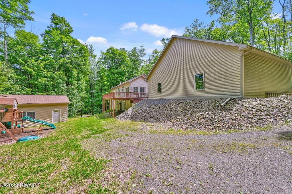 131 Anderson Road Lake Ariel, PA 18436 - Photo 38 of 47 a backyard of a house with lots of green space
