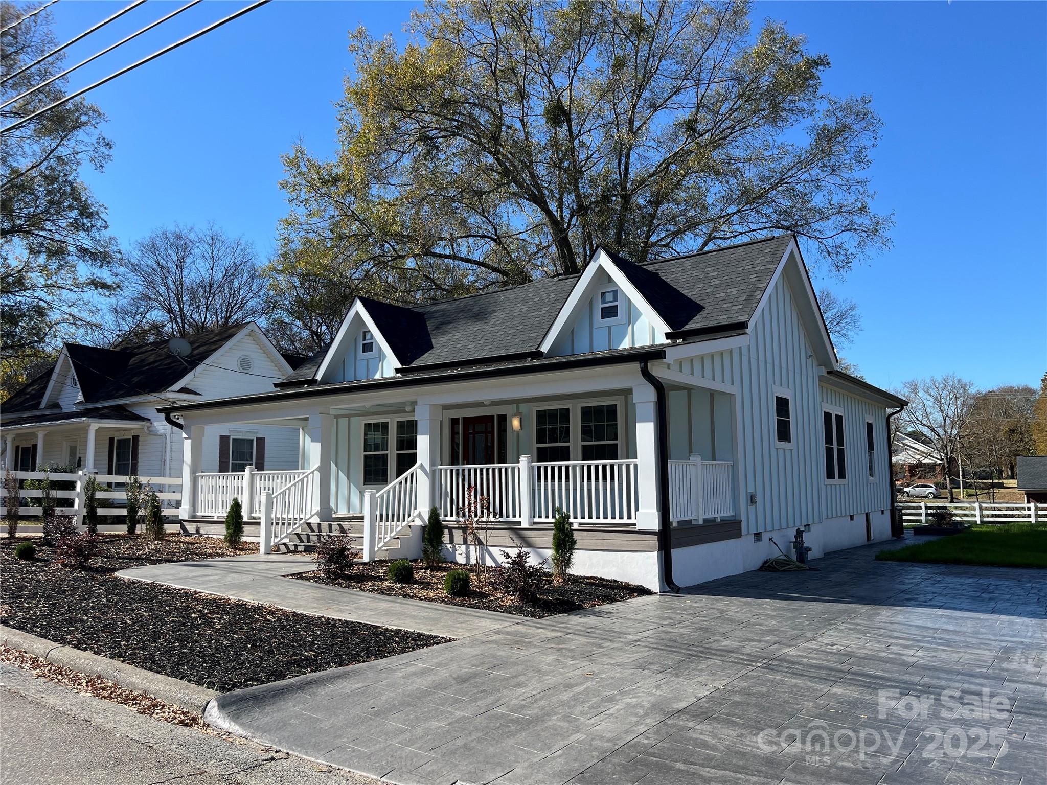 a front view of a house with porch