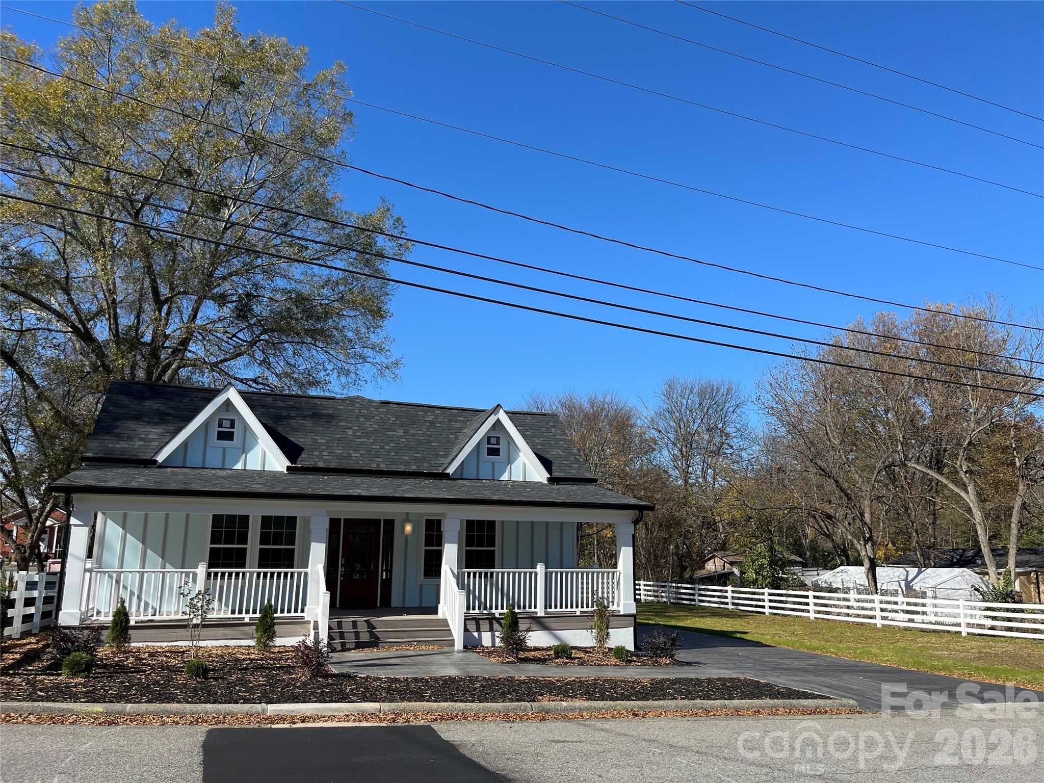 417 Boyte Street Monroe, NC 28110 - Photo 11 of 42 a front view of a house with a garden