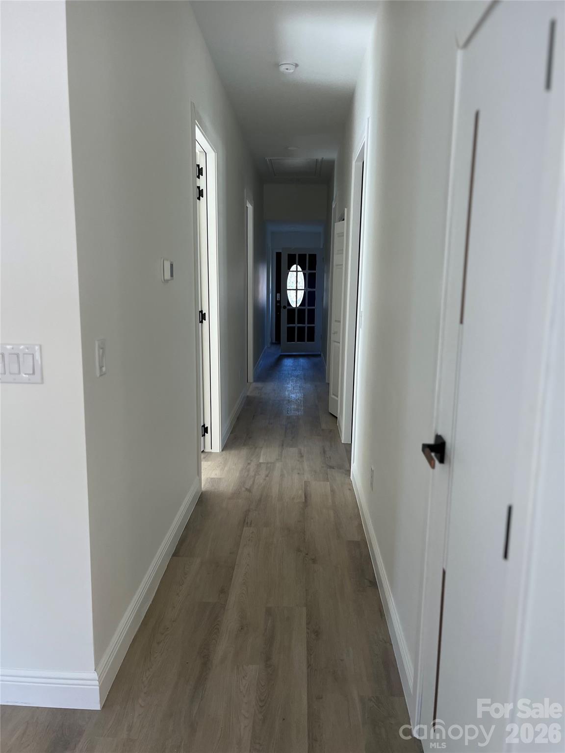 417 Boyte Street Monroe, NC 28110 - Photo 26 of 42 a view of a hallway with wooden floor