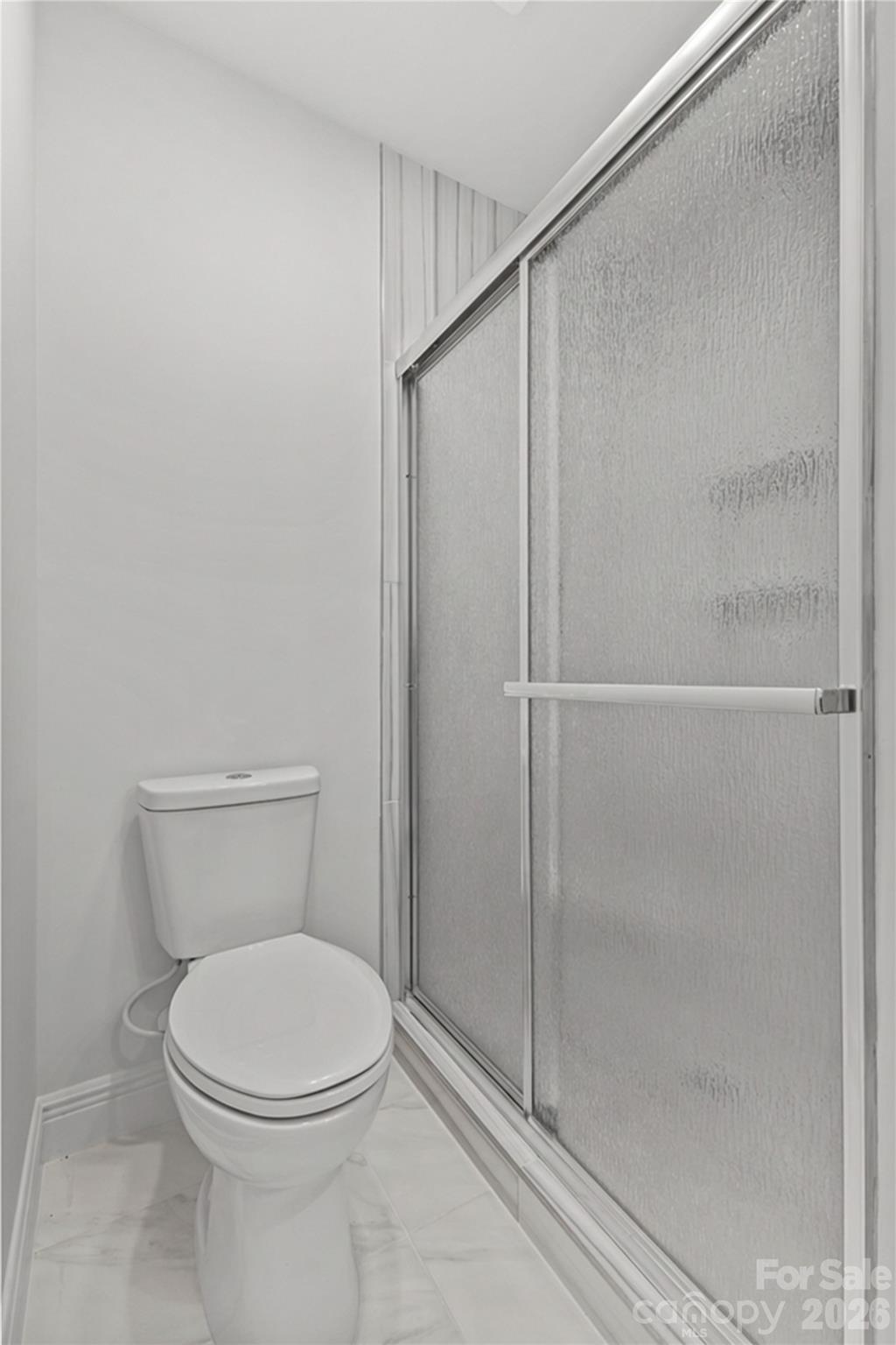 417 Boyte Street Monroe, NC 28110 - Photo 28 of 42 a bathroom with a toilet and a shower