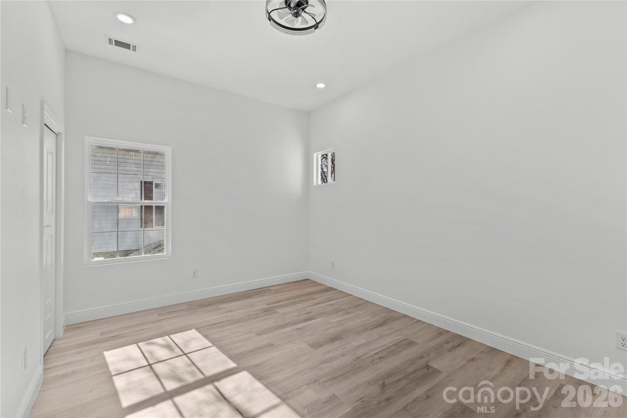 417 Boyte Street Monroe, NC 28110 - Photo 38 of 42 an empty room with windows
