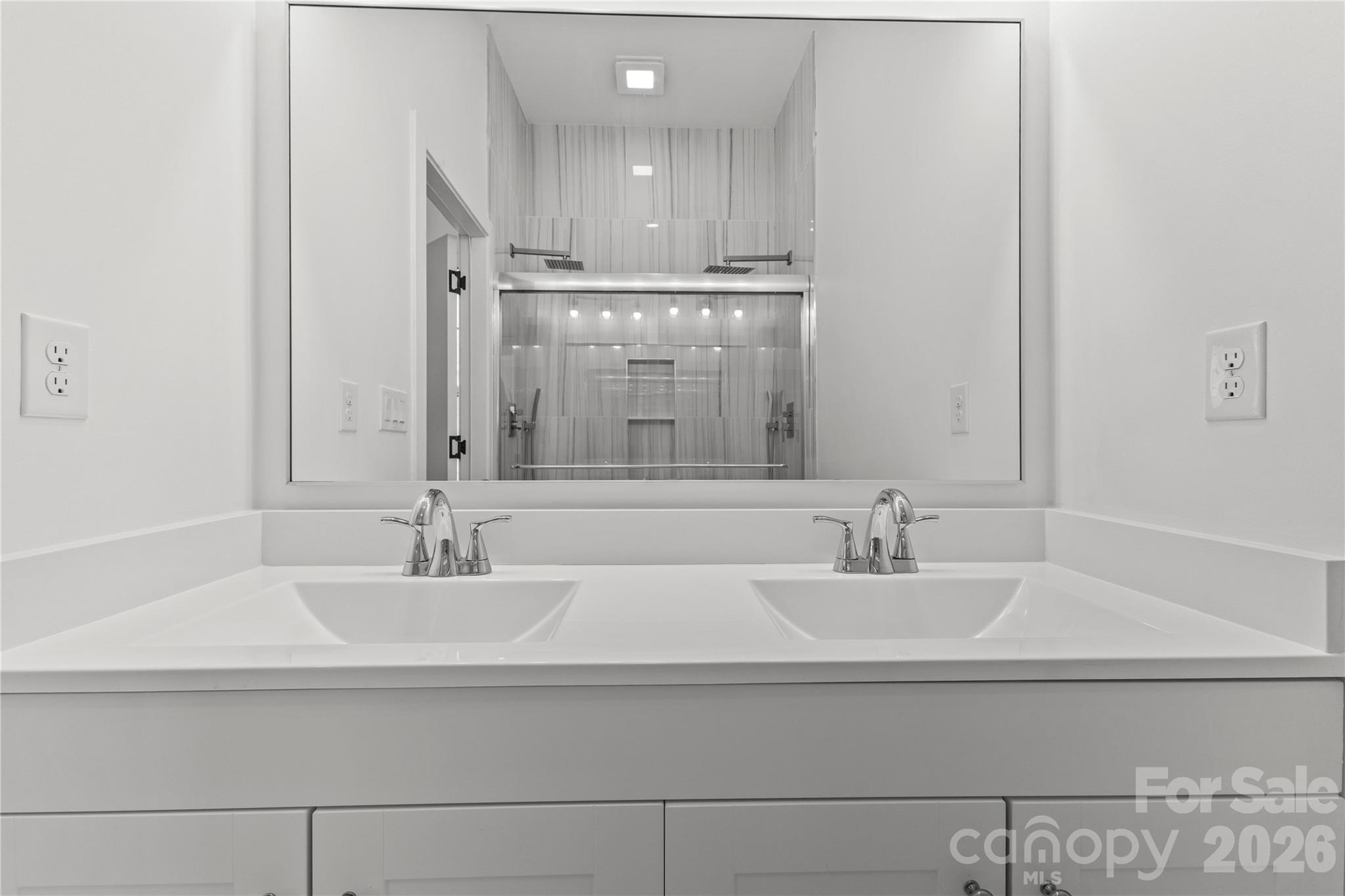 417 Boyte Street Monroe, NC 28110 - Photo 40 of 42 a bathroom with a sink and a mirror