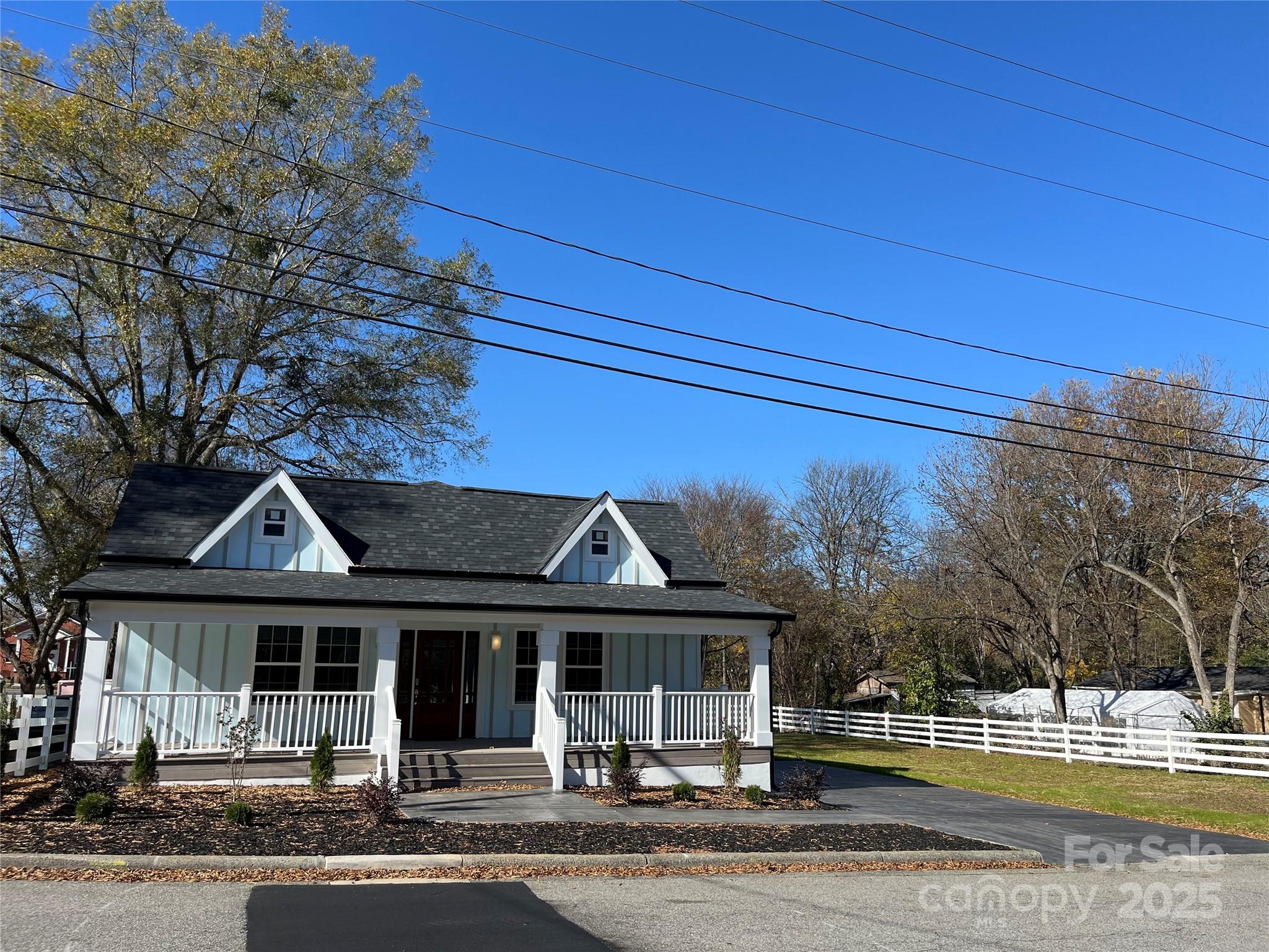 417 Boyte Street Monroe, NC 28110 - Photo 4 of 25 a front view of a house with a garden