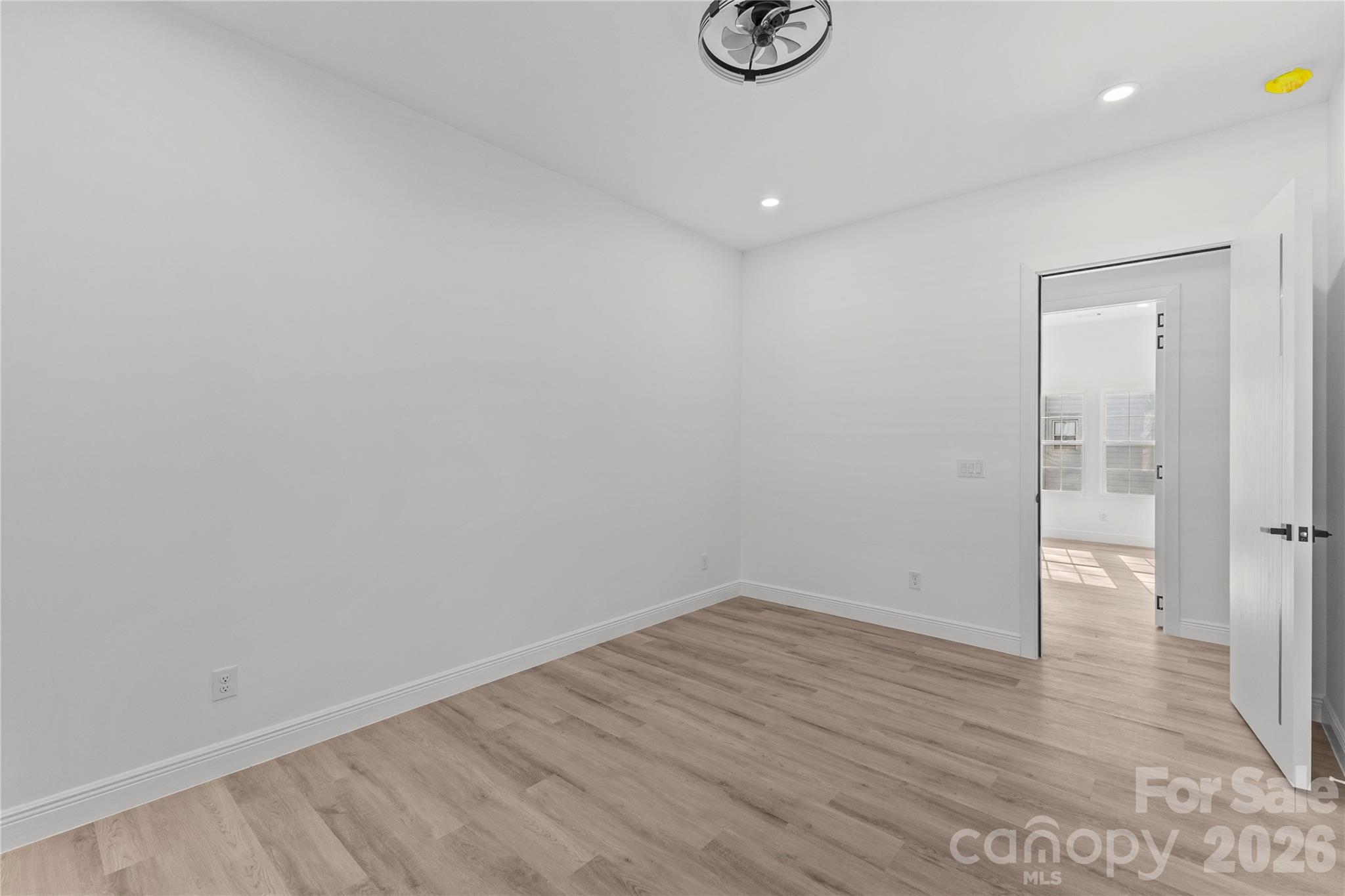 417 Boyte Street Monroe, NC 28110 - Photo 41 of 42 a view of a room with wooden floor