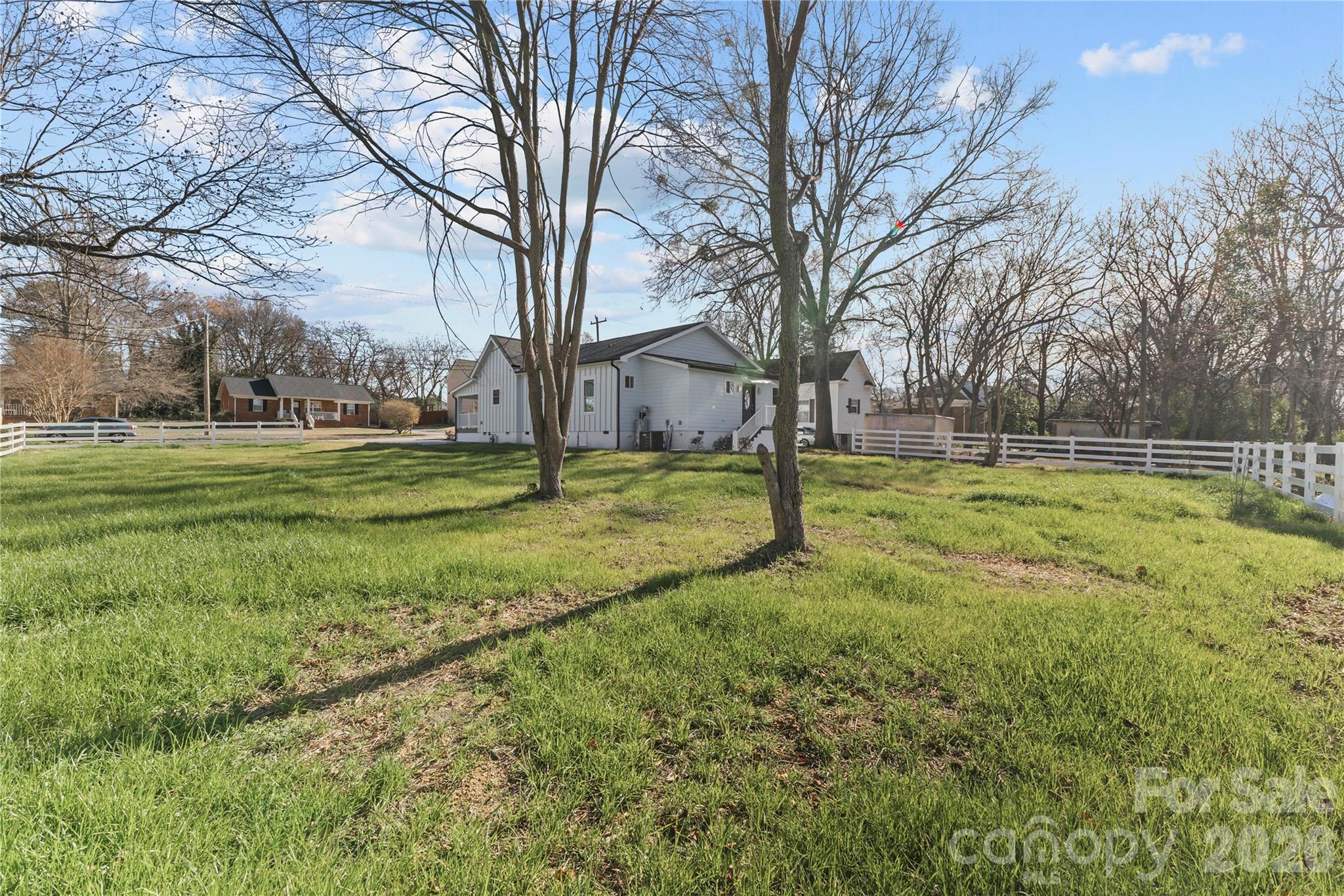 417 Boyte Street Monroe, NC 28110 - Photo 6 of 42 a view of a house with a yard