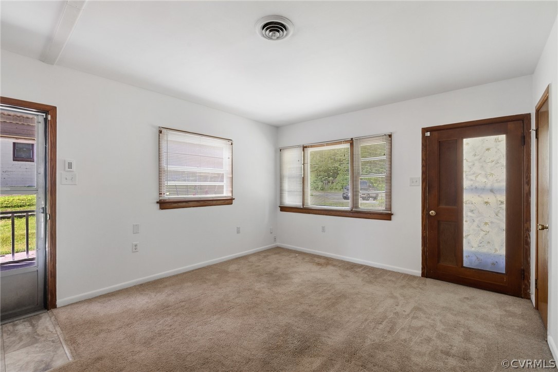 11109 Chester Road Chester, VA 23831 - Photo 5 of 20 a view of an empty room with window