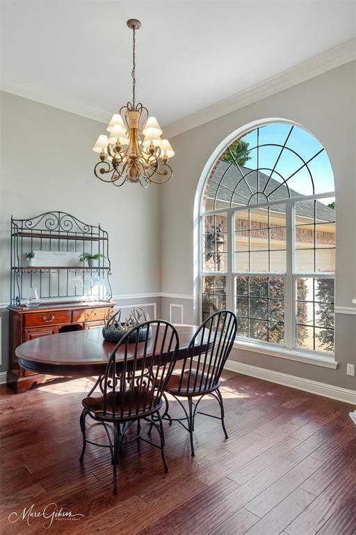 2228 Grapevine Lane Haughton, LA 71037 - Photo 12 of 25 a view of a dining room with furniture window and wooden floor