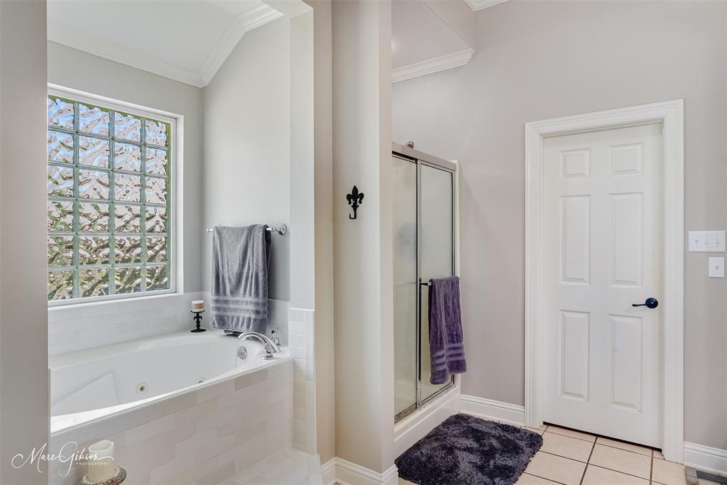 2228 Grapevine Lane Haughton, LA 71037 - Photo 15 of 25 a bathroom with a bathtub a toilet and a shower