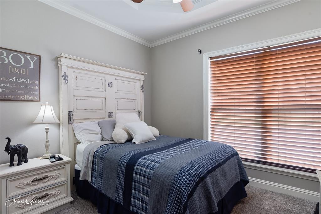 2228 Grapevine Lane Haughton, LA 71037 - Photo 19 of 25 a bedroom with a bed and a window