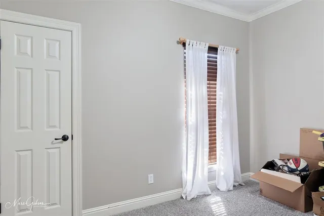 a view of room with stairs and furniture