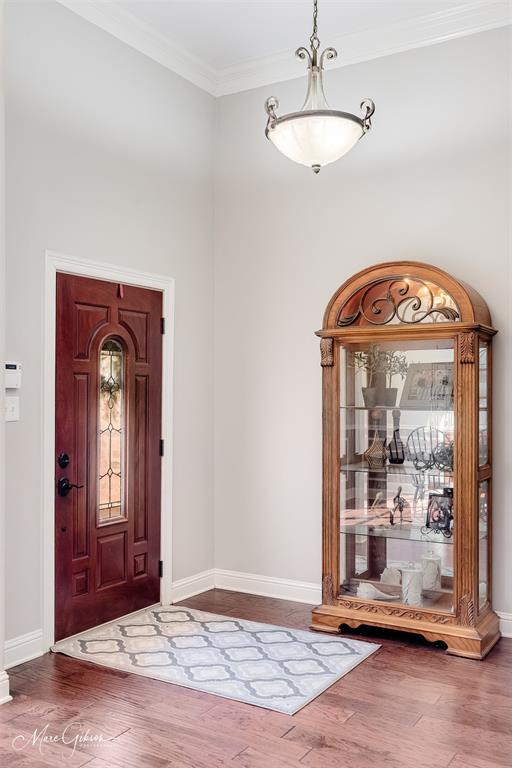 2228 Grapevine Lane Haughton, LA 71037 - Photo 2 of 25 a view of a room with wooden floor and a view of front door