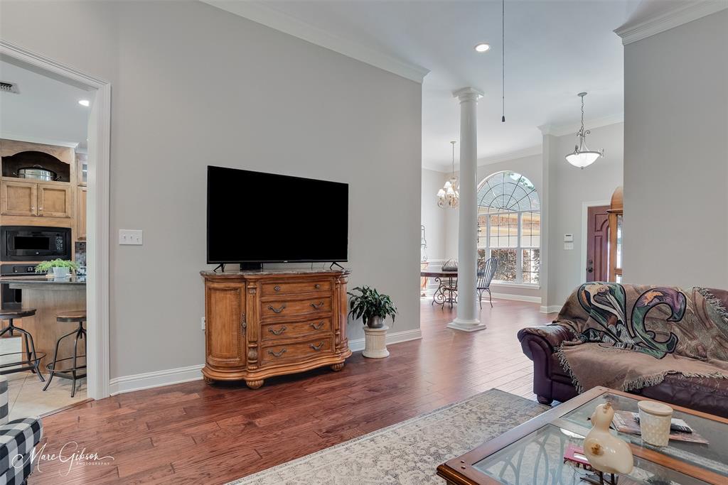 2228 Grapevine Lane Haughton, LA 71037 - Photo 4 of 25 a living room with furniture and a flat screen tv