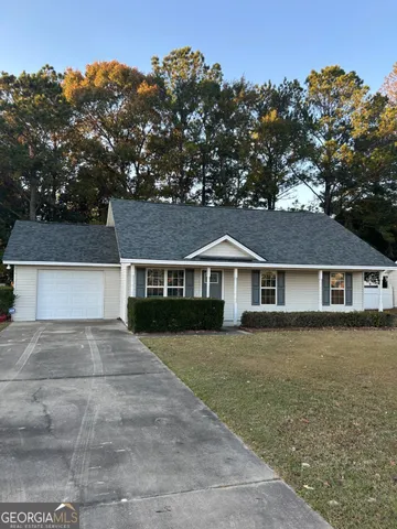 front view of house with a yard