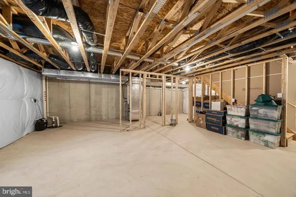 a view of an empty room with furniture