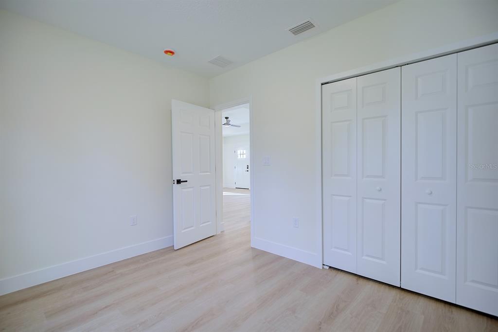 8724 Capilla Street Sebring, FL 33872 - Photo 18 of 33 a view of an empty room